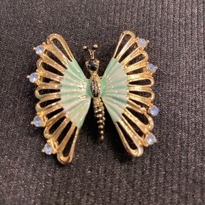 Butterfly pin.